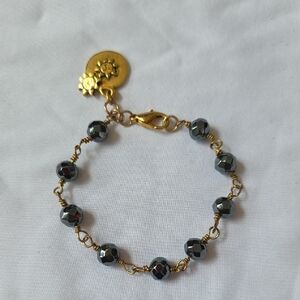 Elegant Gold and Silver Beaded Bracelet